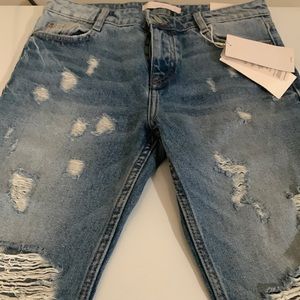 Brand new, never worn Zara totally distressed denim jeans